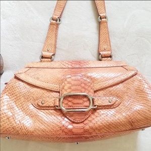 orange snakeskin purse